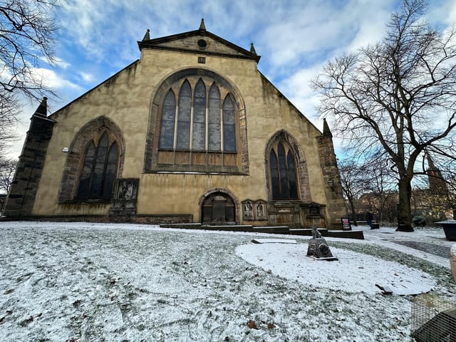 The supposedly haunted graveyard was transformed by the glistening snow.