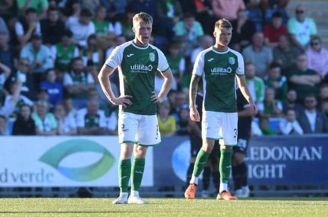 Jake Doyle-Hayes and Kyle McClelland after Hibs were defeated 1-0 by Falkirk in the Premier Sports Cup. Picture: SNS
