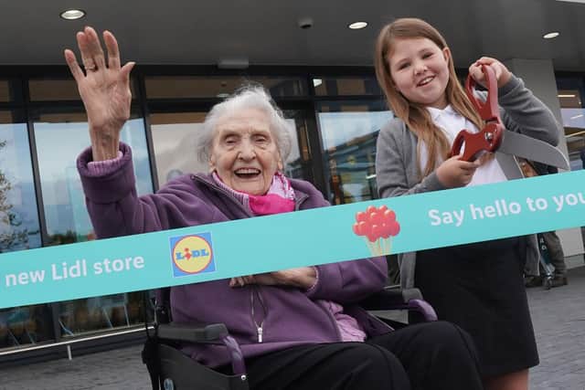 101-year-old Ina Bickerton and nine-year old Chloe Carruthers cut the ribbon on Lidl Corstorphine, officially marking the retailer’s 110th store in Scotland.