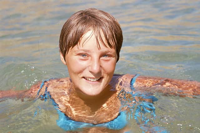 Joan Scambler in the water a couple of years after her terrifying experience