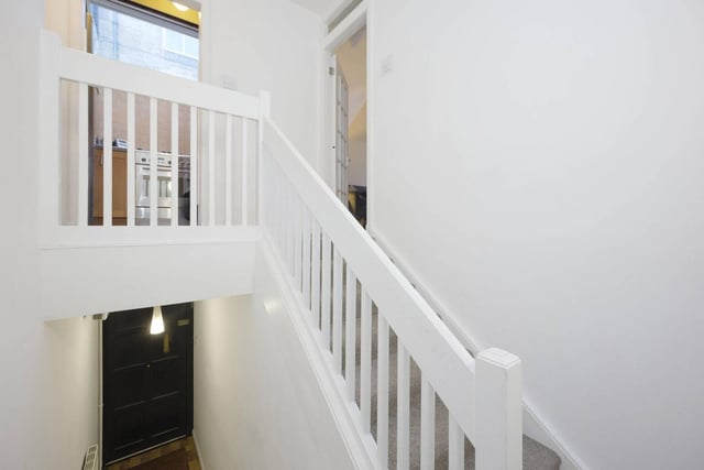 All the rooms are accessed by a staircase which you are faced with upon entering the flat.