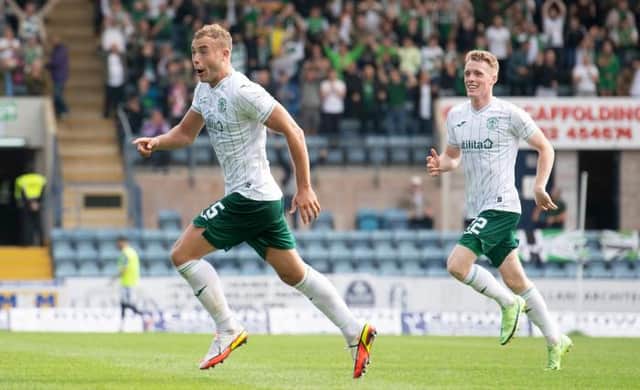 Hibernian's Ryan Porteous celebrates his goal making it 2-1 during a cinch Premiership match between Dundee and Hibernian at Dens Park, on August 22, 2021, in Dundee, Scotland. (Photo by Craig Foy / SNS Group)