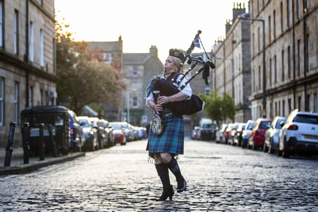Louise Marshall took her pipes onto the streets for the weekly 'Clap for Carers' tribute.