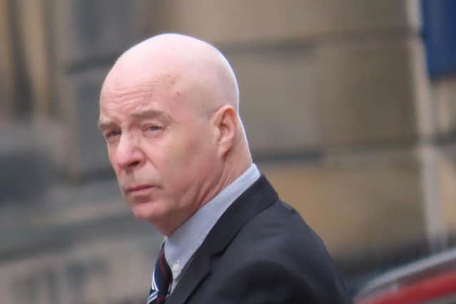 Lothian scowls defiantly after he is convicted of all charges