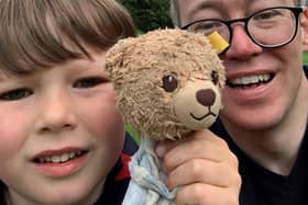 Daniel and Ross Burn out and about in town with Gunther the Bear, who goes everywhere with the pair