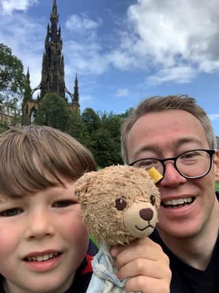 Daniel and Ross Burn out and about in town with Gunther the Bear, who goes everywhere with the pair