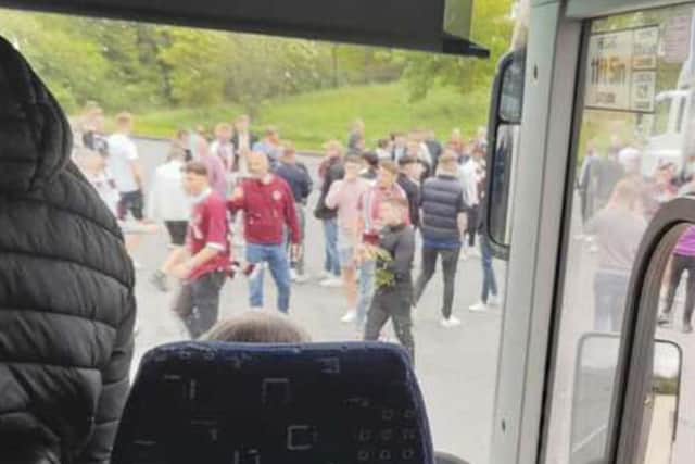 A video of Rangers and Hearts fans fighting at a service station has been shared on social media