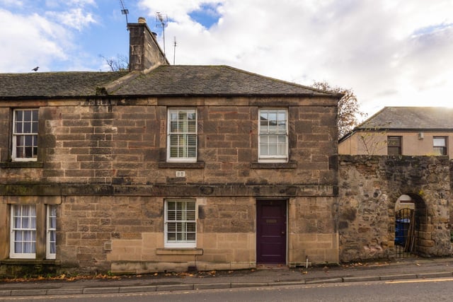 This impressive 1820’s C-Listed, stone built end-terraced house comes with the most beautiful secluded, south facing rear garden with open backdrop to woodland beyond. The property is well positioned within the popular Midlothian town of Dalkeith close to excellent amenities and transport links.