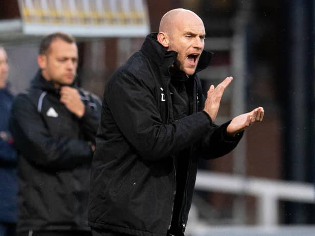 David Gray issues instructions from the dugout at Dens Park
