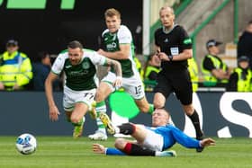 John Lundstram is shown a straight red card for this tackle on Martin Boyle during the 2-2 draw between Hibs and Rangers at Easter Road. Picture: SNS