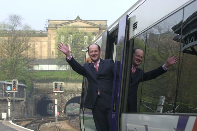 John Swinney was leader of the SNP at the 2003 election. Here, he is setting off on a train from Waverley station to Glasgow Queen Street during the campaign.  
The SNP lost eight seats in the election, taking them down to 27 MSPs.  Mr Swinney would step down the following year, when Alex Salmond returned to the leadership.  When the SNP won power in 2007 Mr Swinney became a key figure in the government, only opting to go to the backbenches earlier this year.