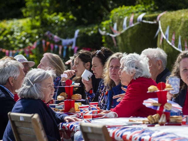 Resident on Murryfield Drive in Edinburgh enjoy the celebrations. Photo: Lisa Ferguson.