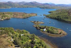 The Dry Island is situated in the Gair Loch, surrounded by incredible Scottish scenery.
