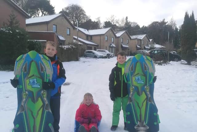 Jack, 11, Chloe, 5, and Ethan, 9 going sledging