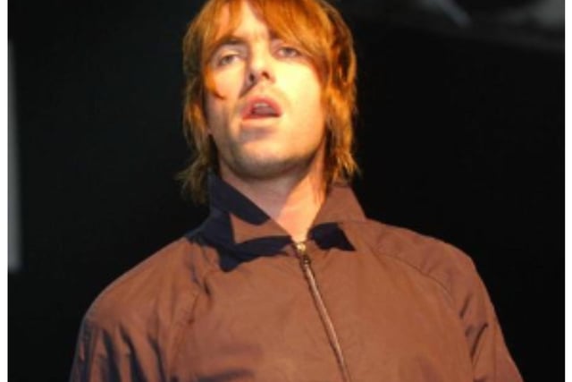 Oasis frontman Liam Gallagher on stage at The Corn Exchange in Edinburgh on September 12, 2002.