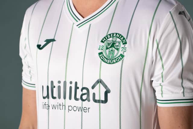 Hibs new away kit features a white design with green pinstripes.