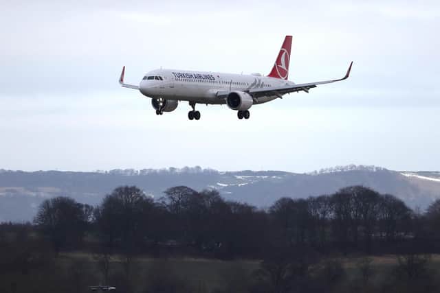 A Turkish Airlines plane arrives at Edinburgh airport on the first day of mandatory managed isolation rules in Scotland.