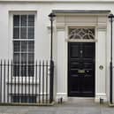 The front door of 11 Downing Street,  the official residence of the Chancellor of the Exchequer.