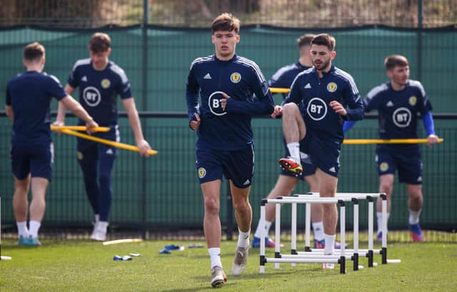 Aaron Hickey trains with Scotland on Tuesday but he is a doubt for the Poland fixture due to feeling unwell.