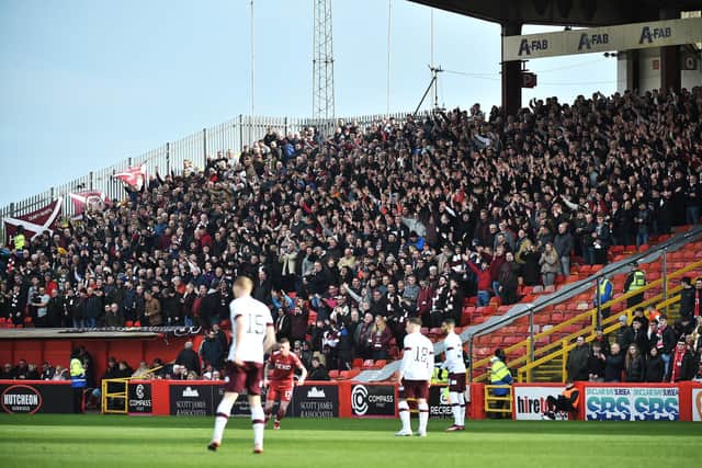 Hearts fans in attendance at Pittodrie. The support have been furious with the performances from their team of late. Picture: SNS