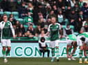 James Jeggo gees up his new team-mates after losing the first goal in Hibs' 3-0 defeat by Hearts
