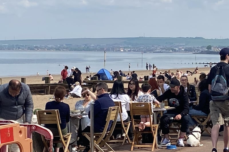 The cafes and bars on the promanade at Portobello Beach were packed.