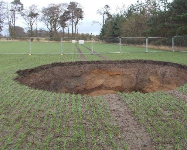 A sinkhole like this one at Roslin is said to have 'swallowed a caravan' on the Bilston site.