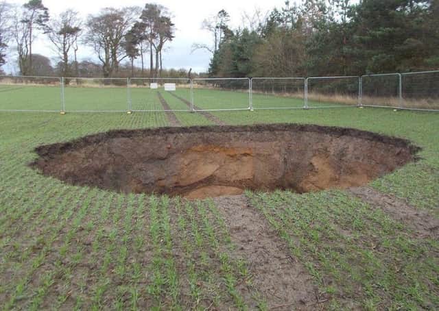 A sinkhole like this one at Roslin is said to have 'swallowed a caravan' on the Bilston site.