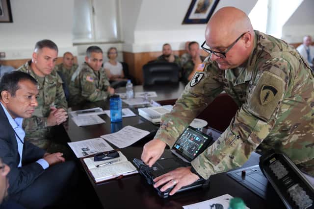 Chief warrant officer Andrew Foreman demonstrated LiFi Kitefin system with Getac LiFi enabled tablet for an audience during the 2nd Theater Signal Brigade’s LiFi exhibition event in August at USAG Wiesbaden. Picture: Candy Knight