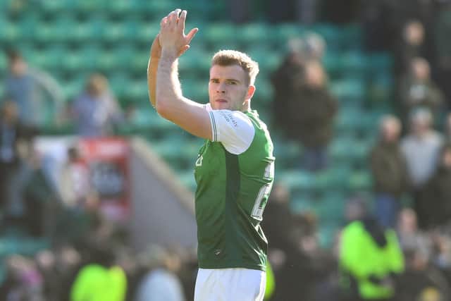 Chris Cadden applauds the Hibs fans at full time following the Celtic game