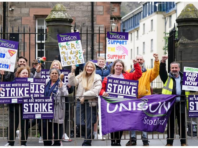 School support workers, who are members of Unison, on the picket line at Royal Mile Primary School in Edinburgh. Jane Barlow/PA Wire