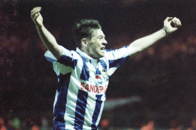 Chris Waddle celebrates after scoring in the FA Cup final replay against Arsenal at Wembley in May 1993.