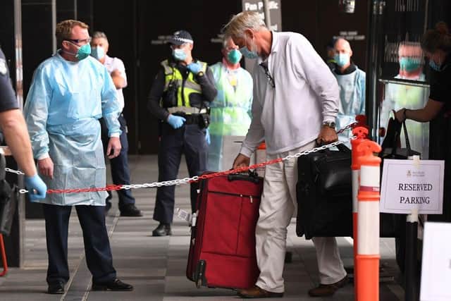 Australia and New Zealand have run quarantine hotels, paid for by the self-isolating guests, since the start of the pandemic. (Photo by William WEST / AFP)