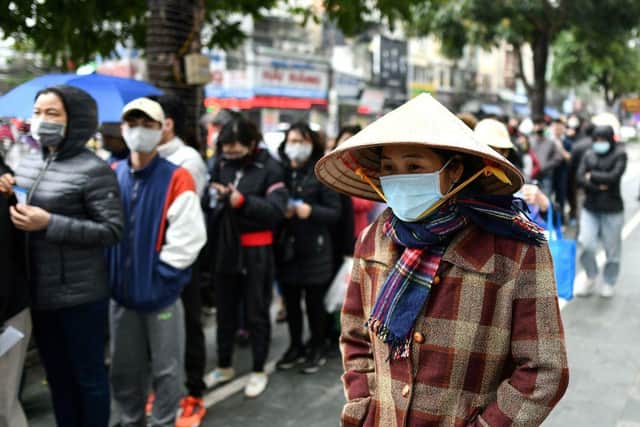 Vietnamese authorities have imposed travel restrictions and quarantine requirements (Photo: MANAN VATSYAYANA/AFP via Getty Images)