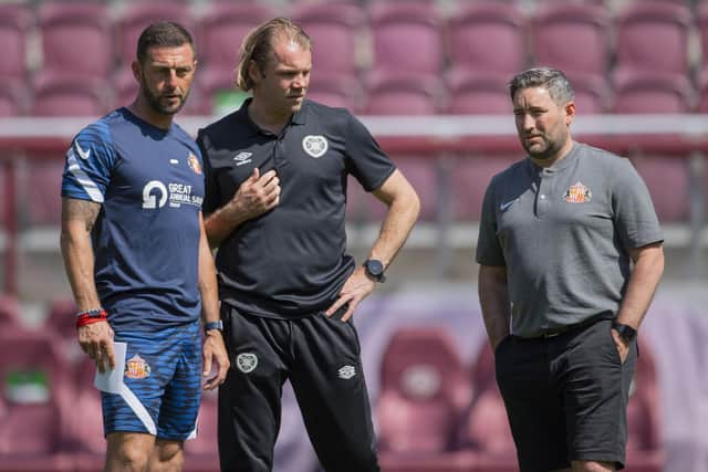 Lee Johnson, right, with Hearts boss Robbie Neilson during a pre-season friendly at Tynecastle last year. Picture: SNS