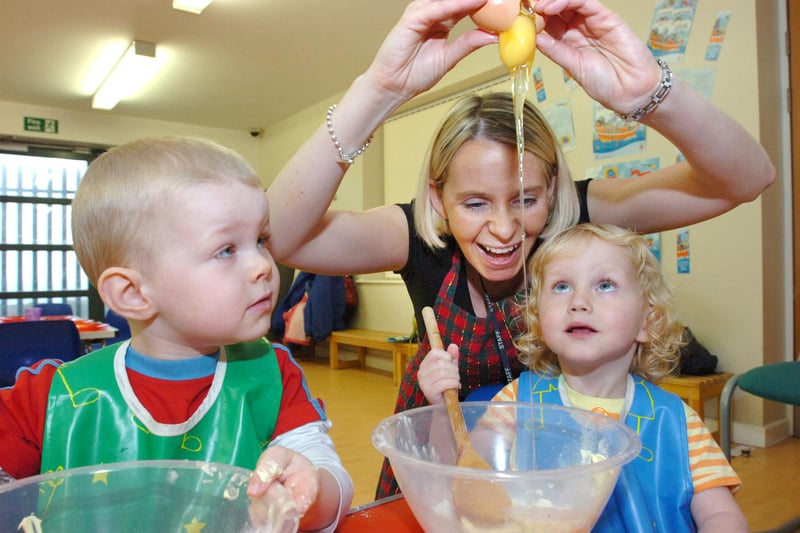 Nursery worker Wendy Walker leads the way in a 2008 baking session at Seaham Sure Start 13 years ago. Does this bring back memories?