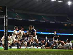 Scotland winger Duhan van der Merwe bursts through the England defence on his way to scoring the only try of the match in the 11-6 win at Twickenham. Picture: Mike Hewitt/Getty Images