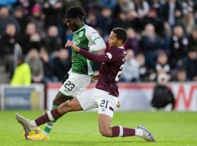 Toby Sibbick makes a last-ditch tackle to deny Elie Youan a free shot at goal during Hearts' 3-0 win over Hibs in the Edinburgh derby. Picture: SNS