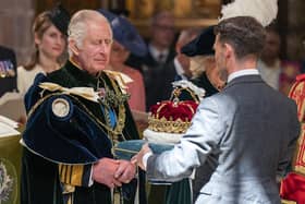 The Crown of Scotland is presented to King Charles III by The Duke of Hamilton and Brandon at St Giles' Cathedral, Edinburgh. Photo credit: Jane Barlow/PA Wire