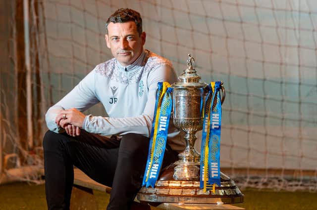 Hibs manager Jack Ross poses with the Scottish Cup ahead of their semi-final derby tussle with Hearts. Photo by Mark Scates/SNS Group