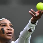 US player Serena Williams wearing plasters on her face during the match with France's Harmony Tan at Wimbledon 2022 (Photo by GLYN KIRK/AFP via Getty Images)