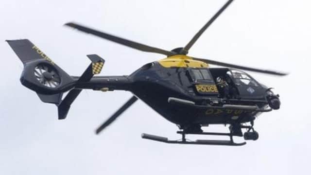 The Police Scotland helicopter was assisting.