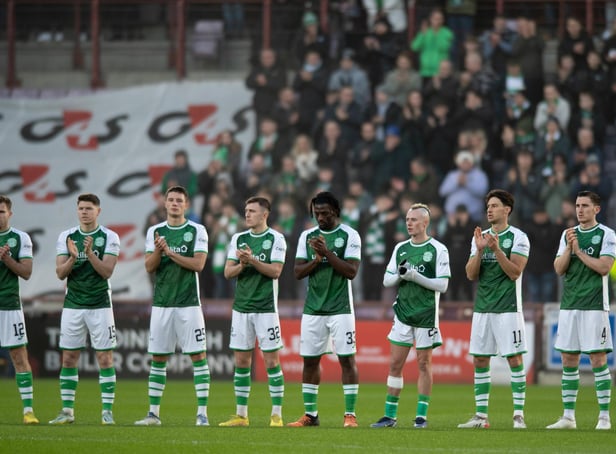 The Hibs players participate in a minute's applause to remember Brazilian football legend Pele ahead of the Edinburgh derby