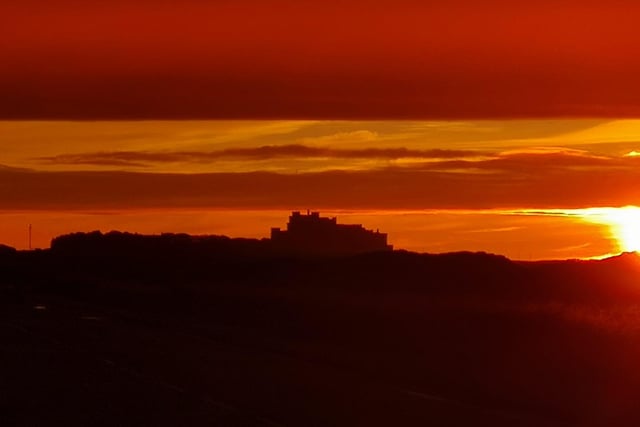 The sunset at Bamburgh Castle.