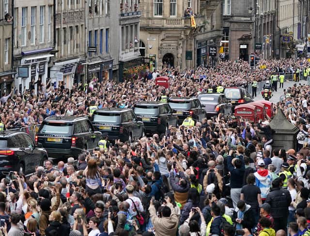 Huge crowds turned out to pay their respects as the cortege carrying the coffin of the late Queen Elizabeth II passed through Edinburgh (Picture: Ian Forsyth/WPA pool/Getty Images)