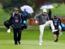 Bob Macintyre gives his caddie Mikey Thomson a laugh as he jokes around makes his way towards the 18th green during the second round of the Betfred British Masters hosted by Danny Willett at The Belfry. Picture: Picture: Richard Heathcote/Getty Images.