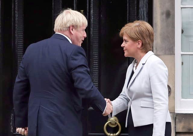 First Minister Nicola Sturgeon and Prime Minister Boris Johnson outside Bute House in Edinburgh