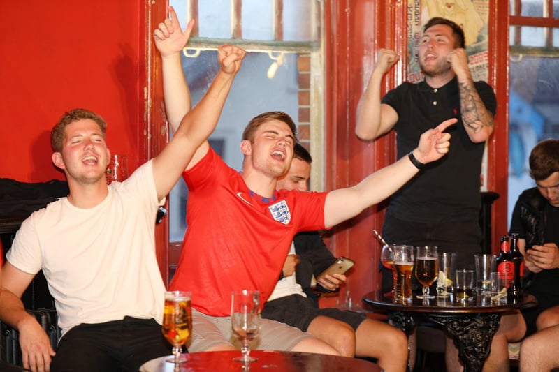 Celebrations at full-time. Fans watch England v Ukraine in the quarter finals of Euro 2020, in The Kings pub, Albert Rd, Southsea. Picture: Chris Moorhouse (jpns 030721-24)