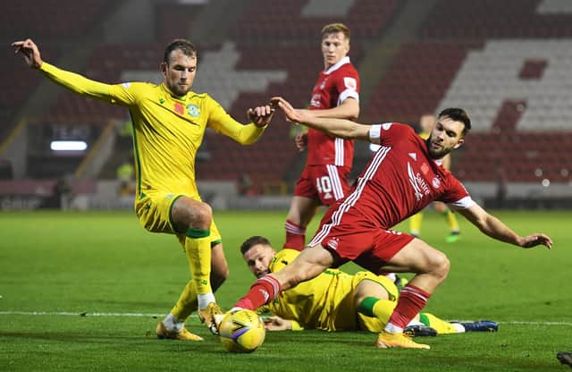 Christian Doidge in action against Aberdeen during the last meeting between the two teams
