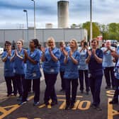 NHS staff at Glasgow's Queen Elizabeth University Hospital participate in the Clap for Carers and key workers. Picture: Jeff J Mitchell/Getty Images
